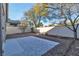 Private backyard area with stone landscaping and concrete patio, ideal for outdoor enjoyment and low-maintenance living at 10200 Wood Work Ln, Las Vegas, NV 89135