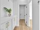 Bright hallway featuring built-in cabinets and access to other rooms at 10200 Wood Work Ln, Las Vegas, NV 89135
