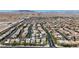 Expansive aerial view of the residential neighborhood with mountain backdrop at 10412 Deer Heights St, Las Vegas, NV 89178