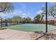 Outdoor basketball court surrounded by mature trees and landscaping at 10412 Deer Heights St, Las Vegas, NV 89178