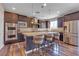 Stylish kitchen with an island, modern appliances, and ample cabinet space at 10412 Deer Heights St, Las Vegas, NV 89178