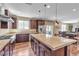 Modern kitchen featuring granite countertops, stainless steel appliances, and a breakfast bar at 10412 Deer Heights St, Las Vegas, NV 89178