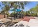 Outdoor playground featuring slides, climbing structures, and picnic benches at 10412 Deer Heights St, Las Vegas, NV 89178
