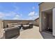 Rooftop patio featuring cozy seating and outdoor living, offering stunning views at 10412 Deer Heights St, Las Vegas, NV 89178
