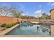 Backyard with a beautiful swimming pool and spa, ideal for outdoor relaxation at 10412 Deer Heights St, Las Vegas, NV 89178