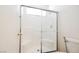 Bathroom featuring glass enclosed shower with seat at 10505 Jeremy Ridge Ave, Las Vegas, NV 89144