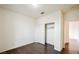 Hardwood floored bedroom with closet and access to the ensuite bathroom at 10505 Jeremy Ridge Ave, Las Vegas, NV 89144