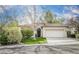 Charming single-story home with a tile roof, well-maintained lawn, and an attached two-car garage at 10505 Jeremy Ridge Ave, Las Vegas, NV 89144