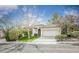 Inviting single-story home featuring a landscaped front yard, neutral paint, and a two-car garage at 10505 Jeremy Ridge Ave, Las Vegas, NV 89144
