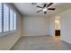 Bedroom featuring carpet, shuttered windows, and an en suite bathroom at 1128 Via Della Curia, Henderson, NV 89011
