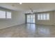 Open concept living space with tile floors, recessed lighting, and plantation shutters at 1128 Via Della Curia, Henderson, NV 89011