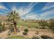 Scenic view from the backyard overlooking the golf course, homes, and mountains at 11534 Glowing Sunset Ln, Las Vegas, NV 89135