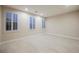 Clean bedroom with tiled floors and bright windows and modern recessed lighting at 11534 Glowing Sunset Ln, Las Vegas, NV 89135