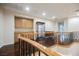 Upstairs landing featuring wood floors, custom cabinetry, and display case at 11534 Glowing Sunset Ln, Las Vegas, NV 89135