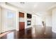 Bright living room with fireplace, built-in shelves, and access to the outdoor patio at 11534 Glowing Sunset Ln, Las Vegas, NV 89135