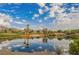 Reflective pond and lush golf course near the neighborhood at 11534 Glowing Sunset Ln, Las Vegas, NV 89135