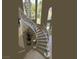 Bright staircase with large windows and elegant chandelier makes a statement at 11534 Glowing Sunset Ln, Las Vegas, NV 89135