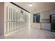 Custom wine room featuring a glass enclosure, custom racks, and ample storage space at 11534 Glowing Sunset Ln, Las Vegas, NV 89135