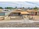 Aerial view showcases a home with covered parking, surrounded by a tidy, low-maintenance landscape at 1189 Blankenship Ave, Las Vegas, NV 89106
