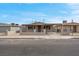 Street view of a cozy one-story home with a covered front patio and desert landscaping at 1189 Blankenship Ave, Las Vegas, NV 89106