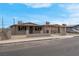A charming single-story home featuring a covered porch and secure fenced yard at 1189 Blankenship Ave, Las Vegas, NV 89106