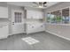 Well-lit kitchen with modern white cabinets and a door to the outside at 1189 Blankenship Ave, Las Vegas, NV 89106