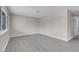 Spacious living area featuring sleek flooring and neutral-toned walls at 1189 Blankenship Ave, Las Vegas, NV 89106