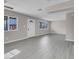 Inviting living room with neutral paint, contemporary flooring, and natural light at 1189 Blankenship Ave, Las Vegas, NV 89106