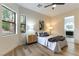 Cozy bedroom featuring natural light and a modern ensuite bathroom at 1350 Rossini St, Henderson, NV 89052