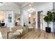 Inviting foyer with modern furnishings, light-colored walls, and a view into the living spaces at 1350 Rossini St, Henderson, NV 89052