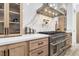 Kitchen with marble backsplash, modern oven range, and ample counter space at 1350 Rossini St, Henderson, NV 89052