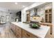 Beautiful kitchen featuring a large island with white countertop and modern appliances at 1350 Rossini St, Henderson, NV 89052