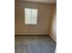 Neutral bedroom with carpet and window with blinds at 1447 Hialeah Dr # B, Las Vegas, NV 89119