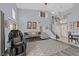 Spacious living area features vaulted ceilings, plush seating, and a staircase to the second floor at 1453 Blisworth Ct # 102, Las Vegas, NV 89102