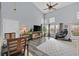 Spacious living area features hardwood floors, large windows, and access to the backyard at 1453 Blisworth Ct # 102, Las Vegas, NV 89102