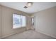 Bedroom featuring neutral carpet and ensuite bathroom access at 1531 Evening Spirit Ave, Las Vegas, NV 89183