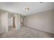 Spacious main bedroom with neutral carpet and walk-in closet access at 1531 Evening Spirit Ave, Las Vegas, NV 89183