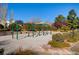 Community playground featuring swings and a sandy play area, perfect for Gathering fun at 1531 Evening Spirit Ave, Las Vegas, NV 89183