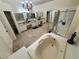 Well-lit bathroom showcasing a soaking tub, shower, and double vanity at 2065 Pinion Springs Dr, Henderson, NV 89074