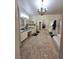 Bright bathroom featuring double vanities, mirrored closet, and separate shower at 2065 Pinion Springs Dr, Henderson, NV 89074