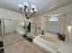 Relaxing primary bathroom boasting a soaking tub, shower, and tiled floors at 2065 Pinion Springs Dr, Henderson, NV 89074