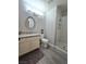 Nicely updated bathroom features granite countertop, shower and modern fixtures at 2065 Pinion Springs Dr, Henderson, NV 89074