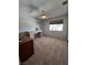Comfortable bedroom with window, ceiling fan and desk at 2065 Pinion Springs Dr, Henderson, NV 89074