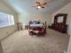 Primary bedroom features a vaulted ceiling and natural lighting at 2065 Pinion Springs Dr, Henderson, NV 89074