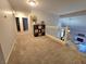 Upstairs hallway has carpet flooring with views of the living room at 2065 Pinion Springs Dr, Henderson, NV 89074