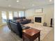 Cozy living area with a fireplace and sliding doors to the yard at 2065 Pinion Springs Dr, Henderson, NV 89074