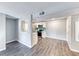 A view of the kitchen with stainless appliances and a pass-through to the living area at 211 Mission Laguna Ln # 205, Las Vegas, NV 89107