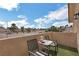 Balcony with furniture and scenic neighborhood views on a sunny day at 2111 River City Dr, Laughlin, NV 89029