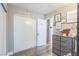 Small bedroom with decorations, closet, and wooden floors at 2111 River City Dr, Laughlin, NV 89029