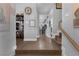 Inviting entryway featuring wooden floors, stairs, and tasteful decor creating a warm welcome at 2111 River City Dr, Laughlin, NV 89029